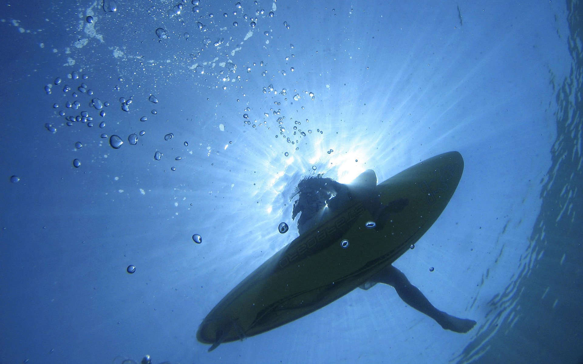 water sea board girl bubbles the ocean under water light the sun