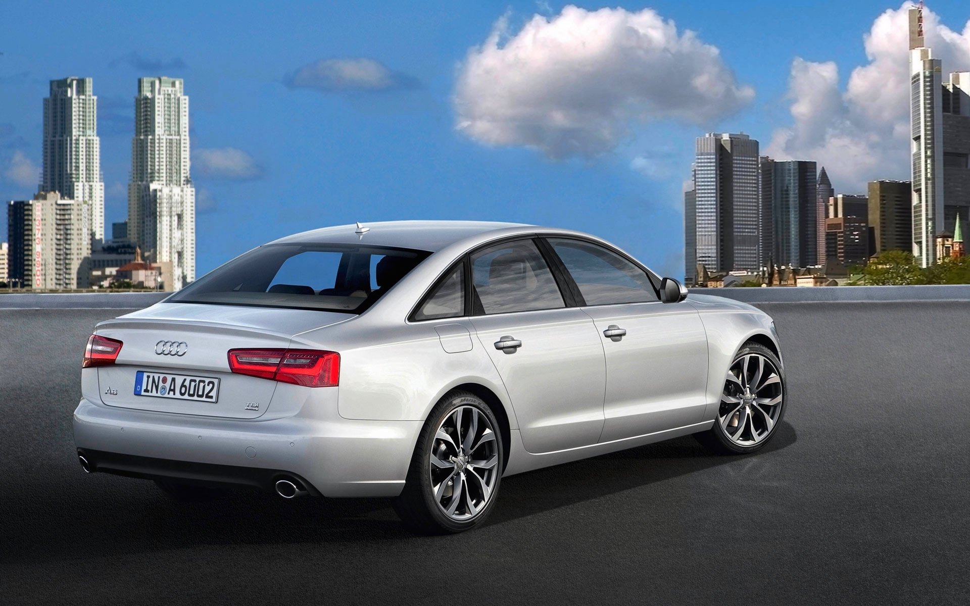 audi a6 auto szary sedan dzień miasto