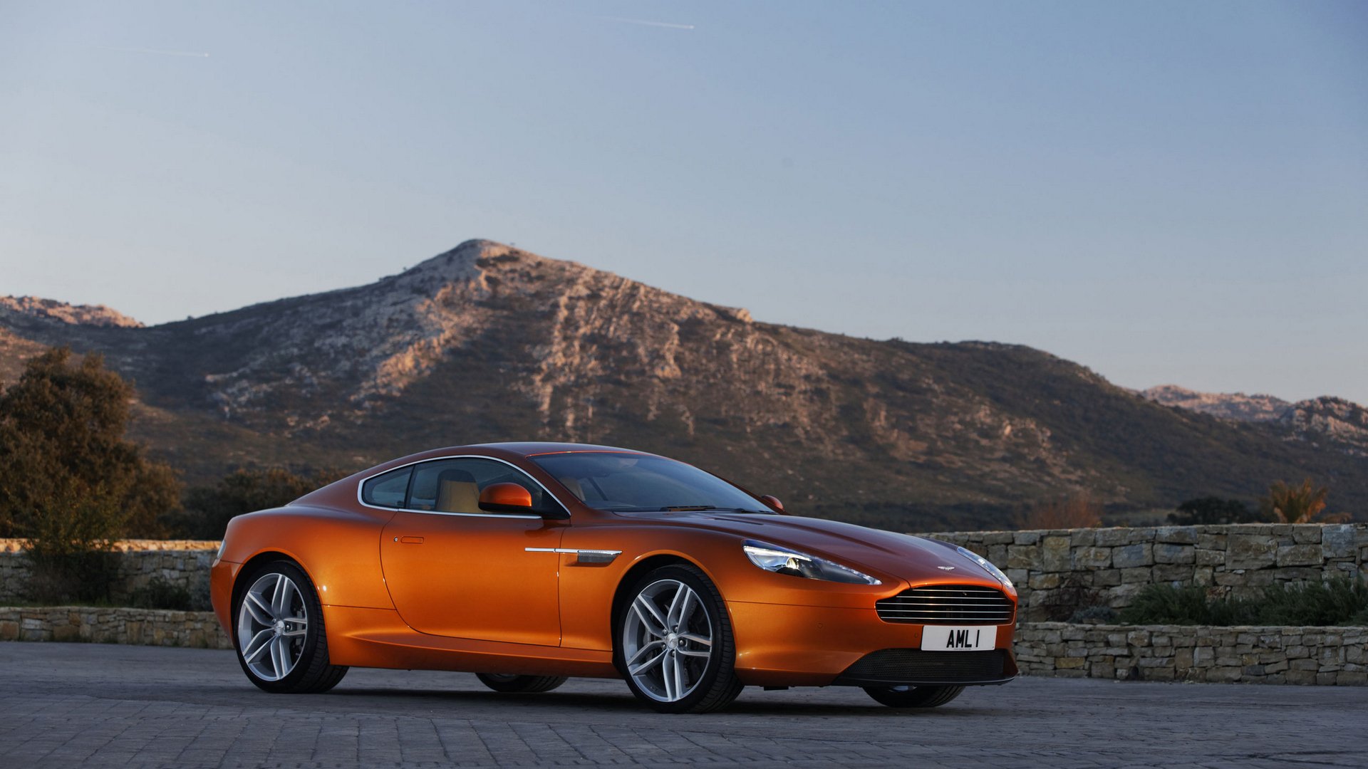 aston martin virage coupe landscape sky mountain