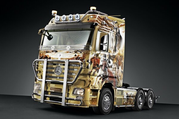 Golden Mercedes-Benz truck stands in black wallpaper