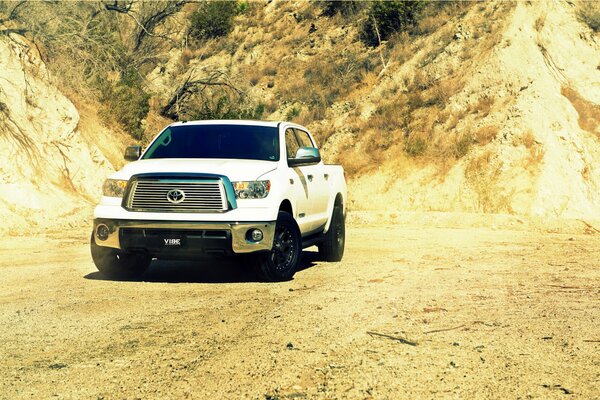 Luxury Toyota Tundra pickup truck in the middle of the desert