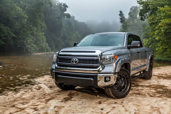 Toyota tundra car on the river bank