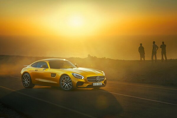 The road to the sea in a yellow car