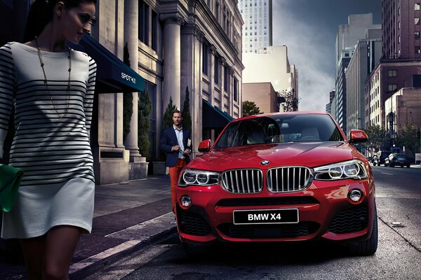 Front view of a red BMW in a European city