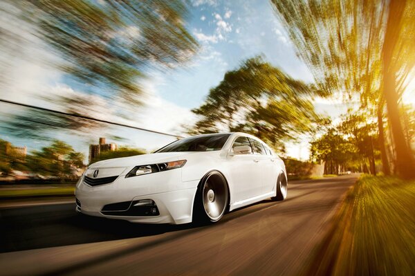 White honda accord on a blurry background