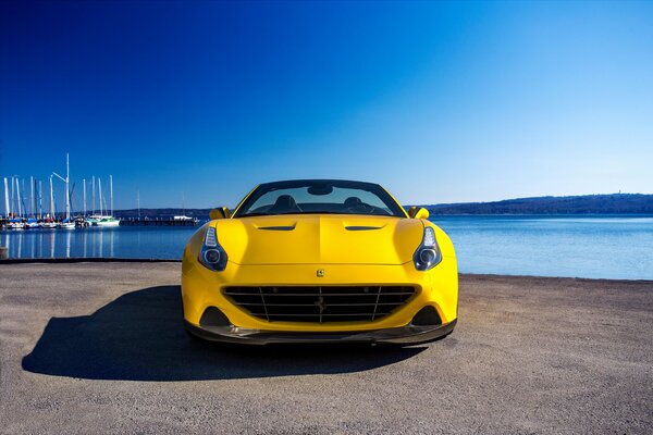 Yellow Ferrari 2015 on phonemore and yachts