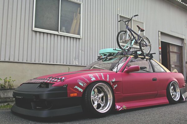 Nissan Silvia with a bicycle on the roof