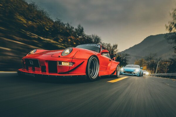 A beautiful Porsche car is rushing at speed