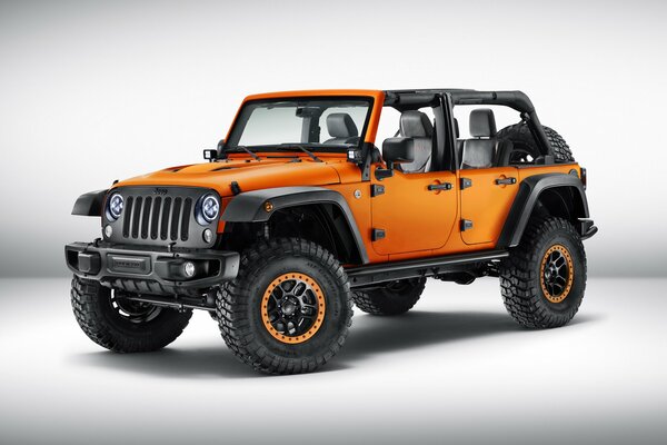 Orange jeep on cool wheels