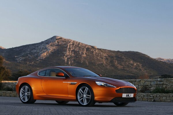 Beautiful car on the background of the highway and picturesque mountains 