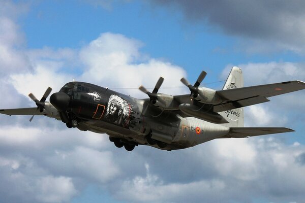 C-130 military transport aircraft at altitude