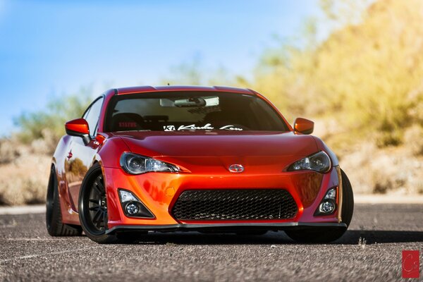 A red foreign car for a cool background