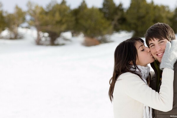 Beautiful couple kissing in the cold