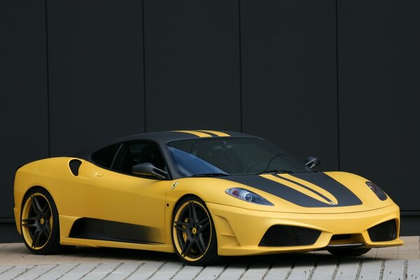 Yellow beautiful Ferrari with black stripes