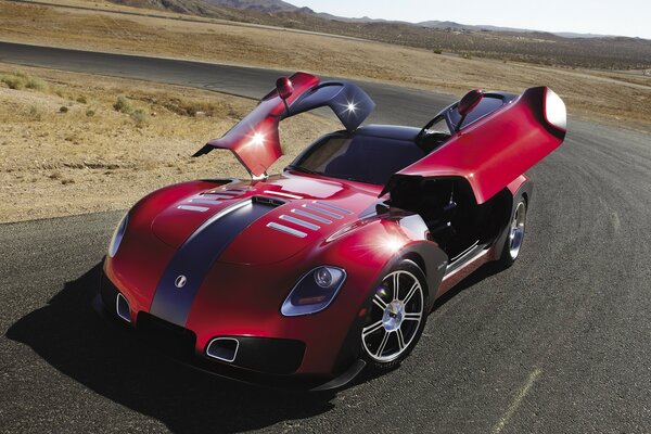 Red sports car with open doors