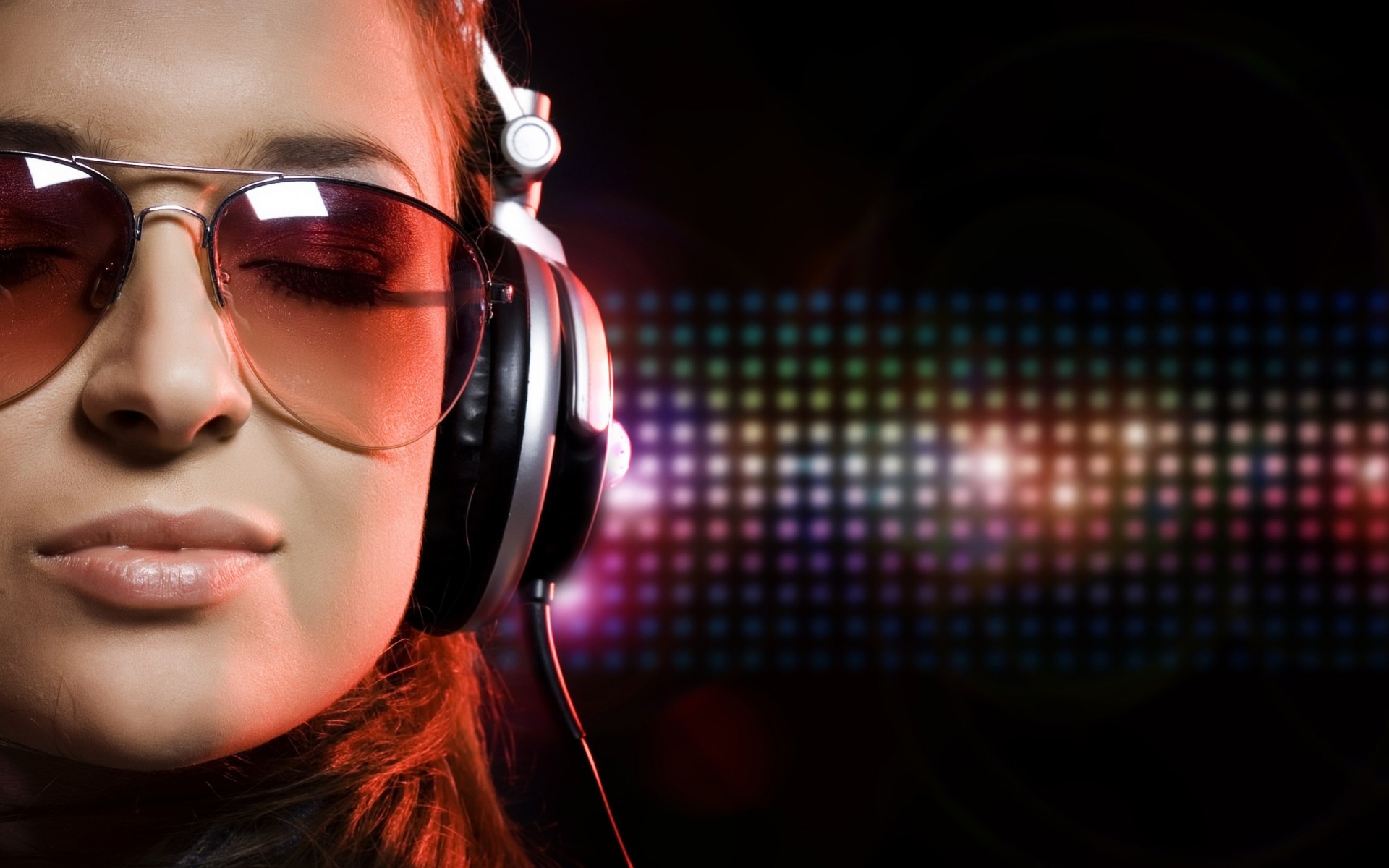 a woman girl black close up headphones sunglasses face