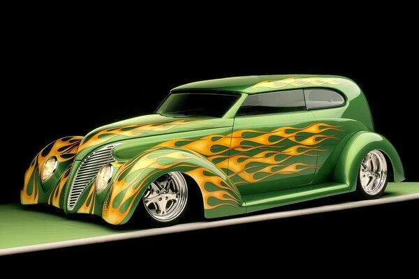 Ford sedan car green with flames side view