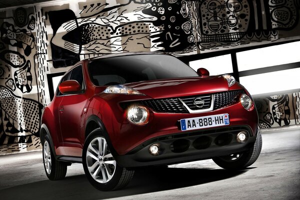 Nissan rossa su uno sfondo bellissimo