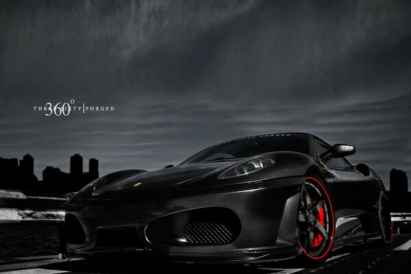 Black sports car at dusk