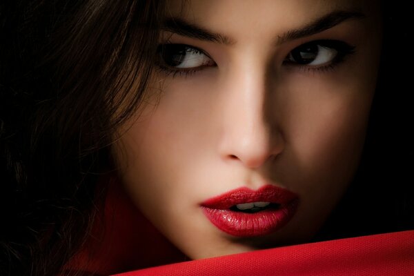 Model girl with red lipstick on her lips