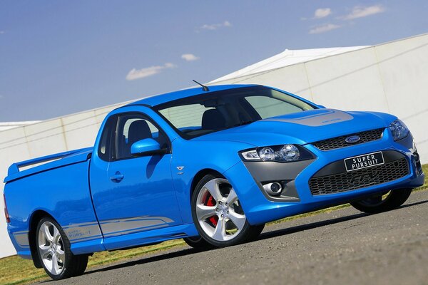 FPV car in blue on a clear day