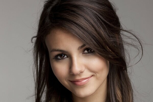 Brunette victoria justice smiles