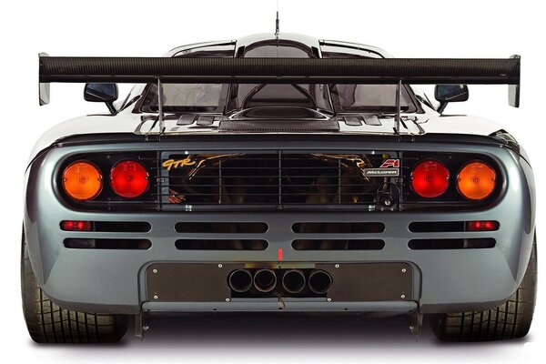 Вид сзади автомобиля Mclaren f1