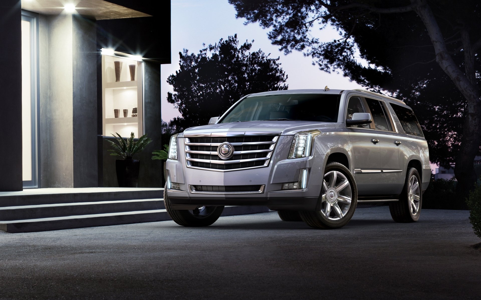 cadillac escalade cadillac escalade jeep suv front end house trees sky