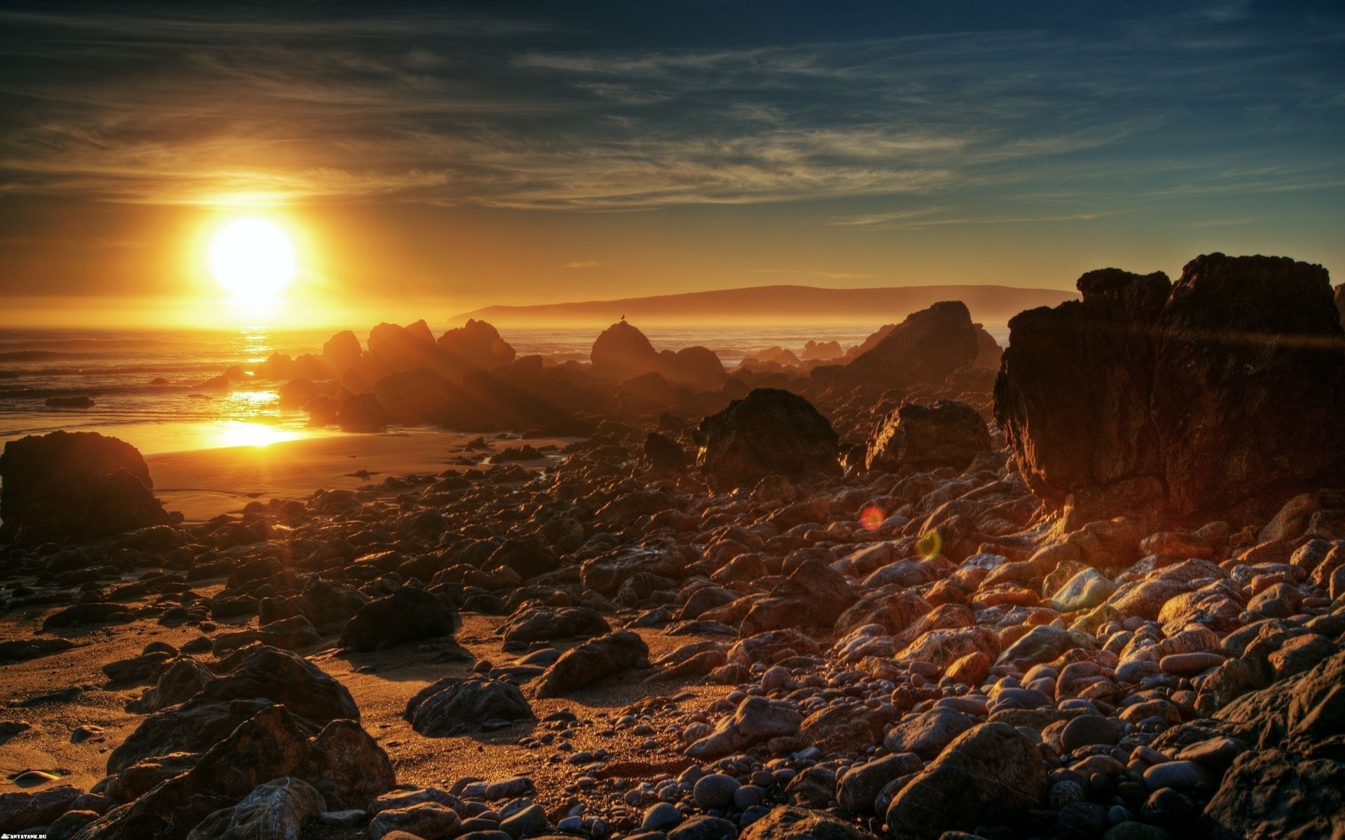 soleil coucher de soleil mer pierres