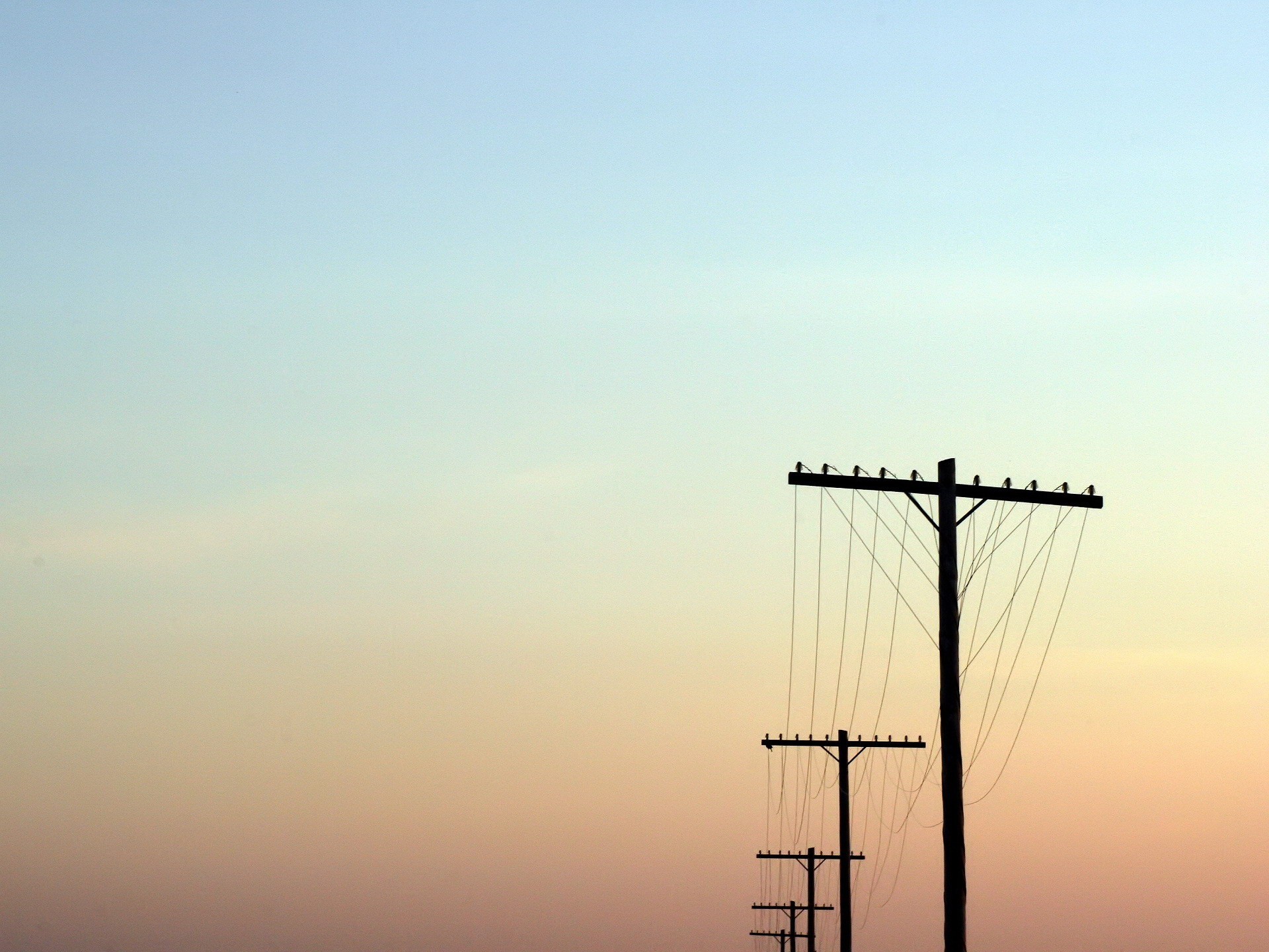 wire pillars sky