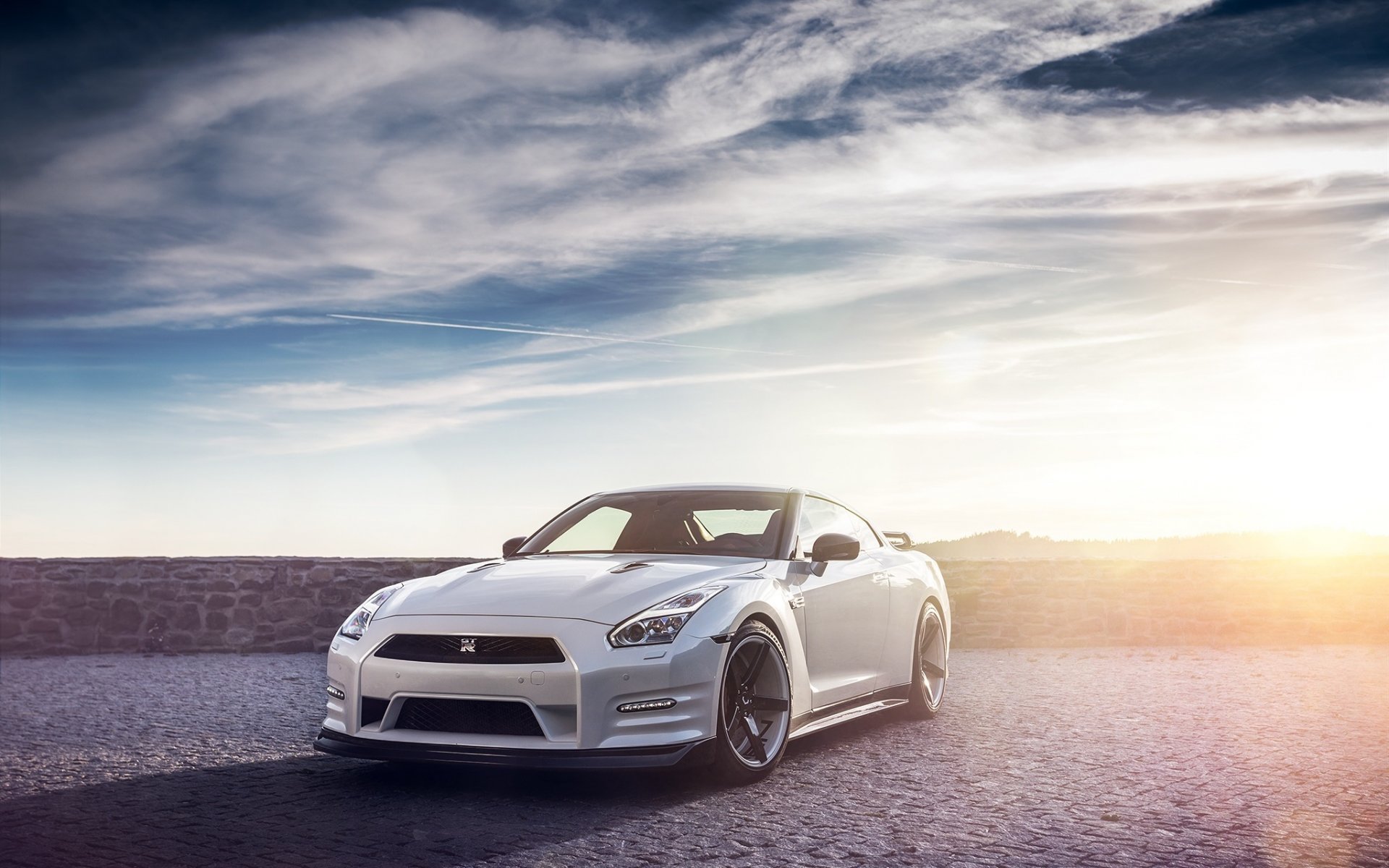 nissan r35 rtm blanc feux jour ciel soleil avant