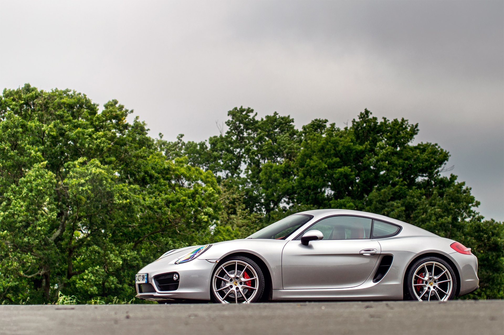 porsche cayman s argent arbres