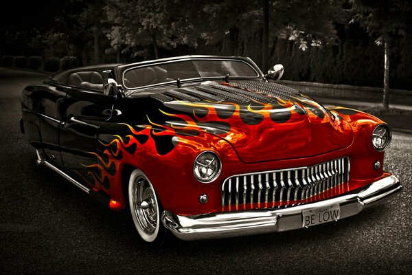 The airbrushed hood of a 1949 convertible