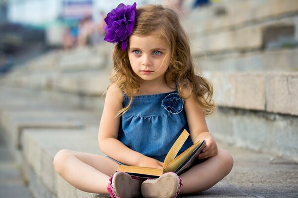 A girl is reading a book, bookish mood