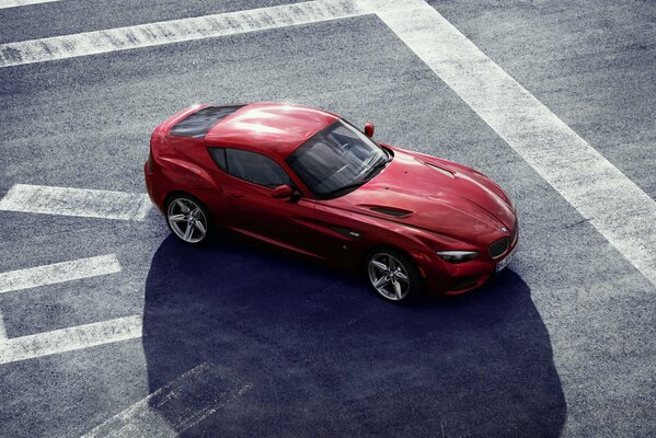 Red zagato on gray asphalt