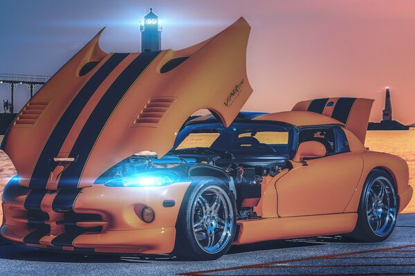 Yellow Dodge Viper with raised hood