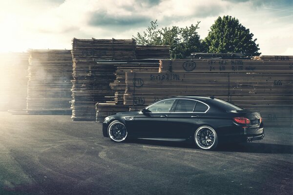 BMW black car on the street background