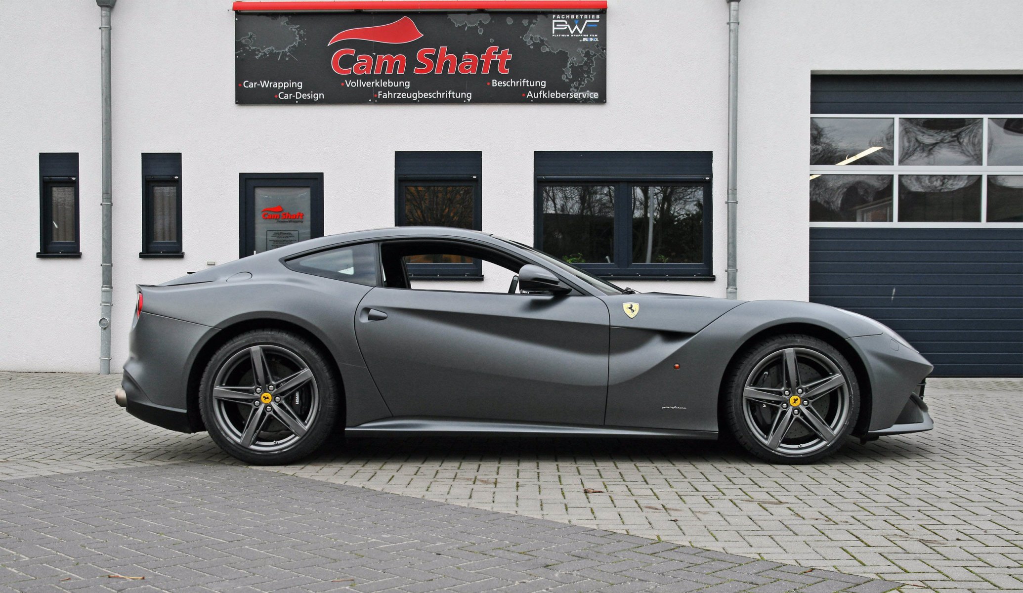 ferrari f12 berlinetta cam shaft a side view silver ferrari