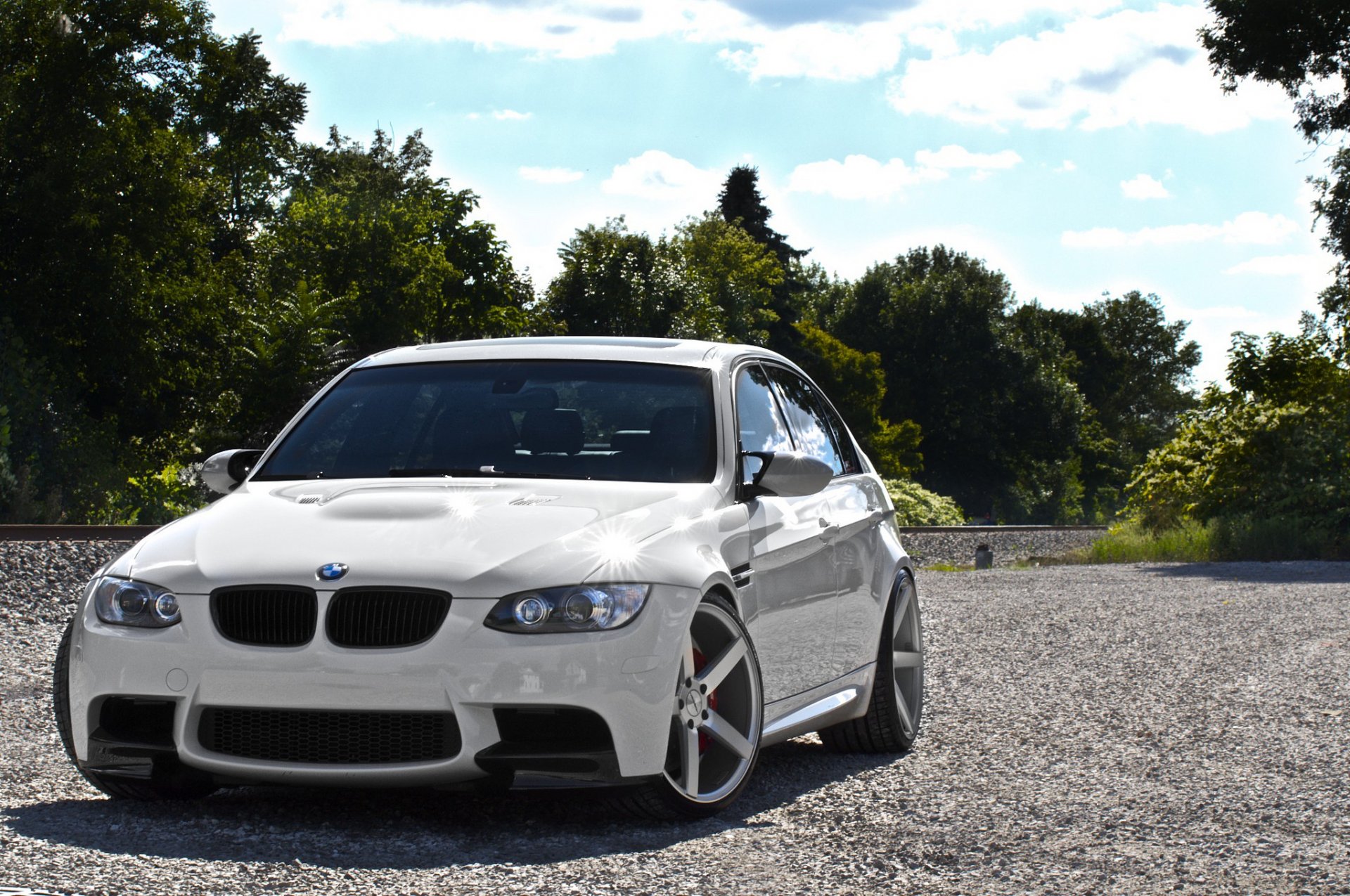 bmw m3 e90 white bmw sedan front view trees sky cloud