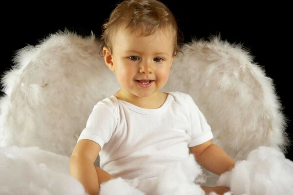 The child is like an angel, with wings on his back