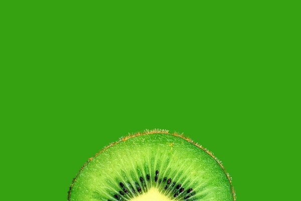 Estetyczna Tapeta kiwi w przekroju. Zielony owoc