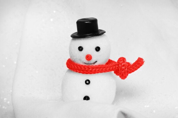 A snowman on a white background in a red balloon