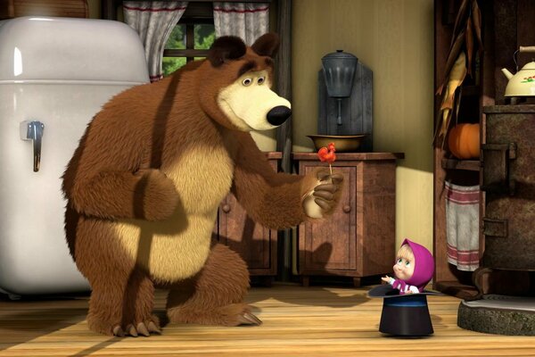 Orso dà Masha un rosso lecca-lecca