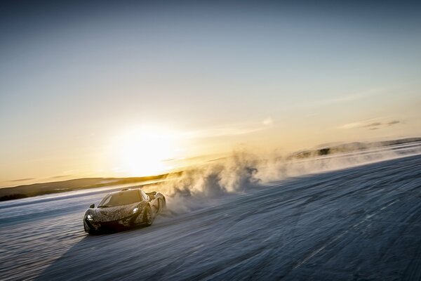 mclaren p1 supercar rides at speed in the snow