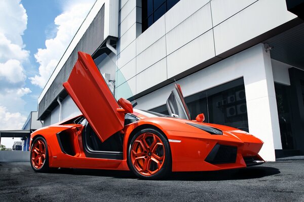 Lamborghini aventador car with an open interior on the background of the production room