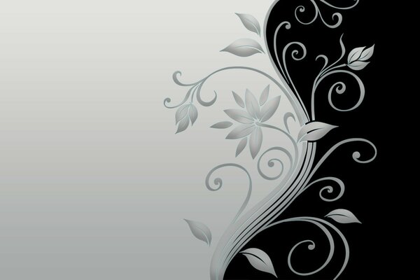 Motif argenté de fleurs sur fond blanc et noir