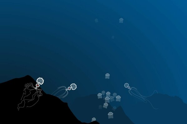 Meduse luminose nella distesa di mare blu