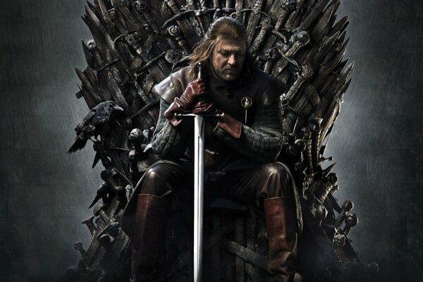 A man with a sword on the throne from the TV series Game of Thrones