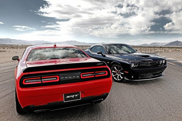 The black car dodged the red car