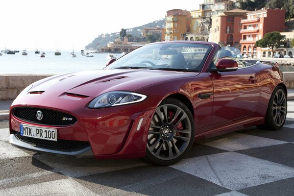 The Jaguar convertible is on the tile
